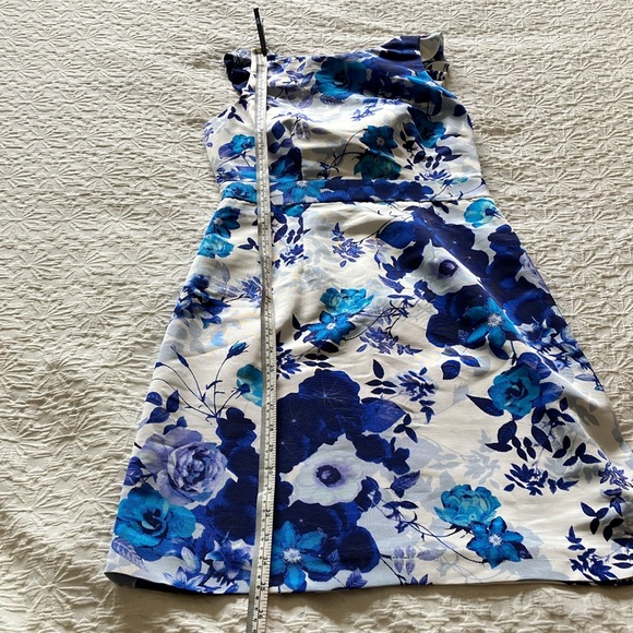 Gorgeous white w/shades of blue floral dress w/fun ruffle & fab back bow 🎀 - Picture 9 of 16